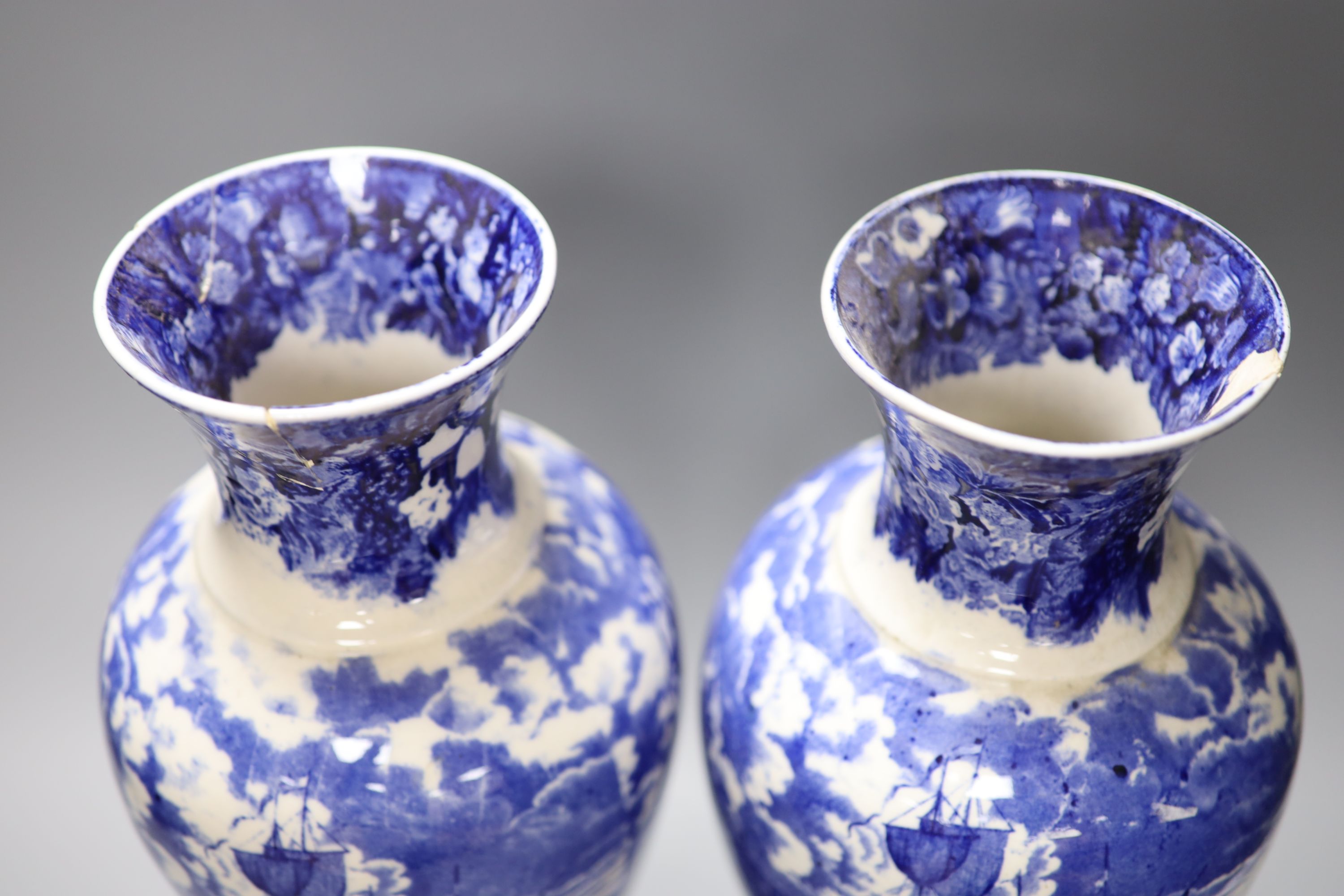 A pair of Wedgwood Ferrara blue and white vases, height 38cm